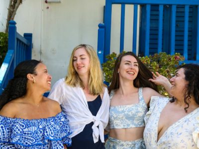 group photography of girlfriends having fun in Mykonos island